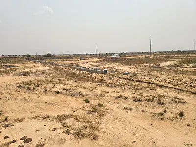 Build Your Dream Home with a 70X50FT Half Plot at Tsopoli Skyport City