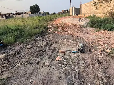 Fully Titled 100 X 70 FT Residential Plot with Road Access