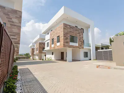 4 Bedroom Townhouse in a Gated Community with Swimming Pool — Airport Residential Area, Accra